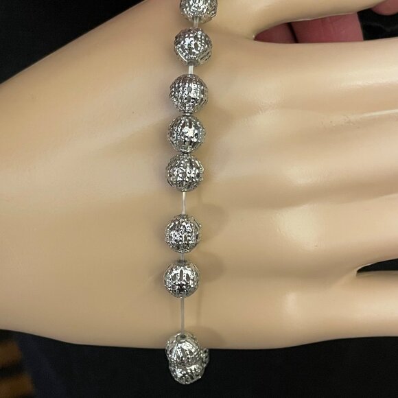 Silver Toned Beaded Stretch Bracelet One Size with Intricate Detailing - Picture 8 of 8
